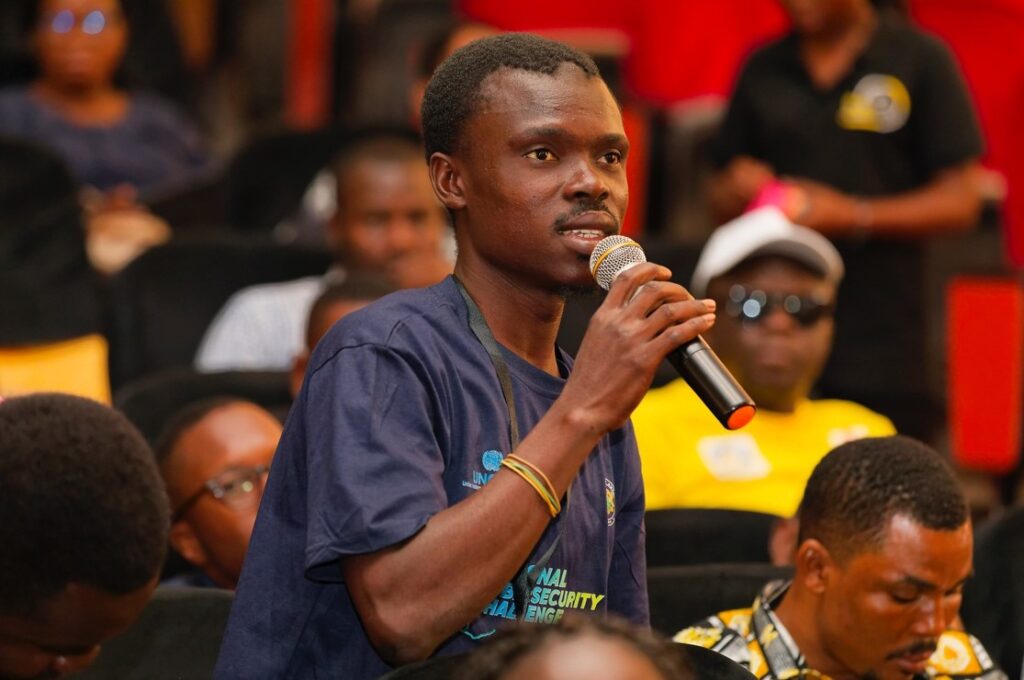A participant posing his question during the Q&A session